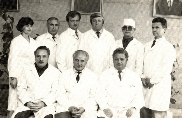 Original faded and damaged family photograph